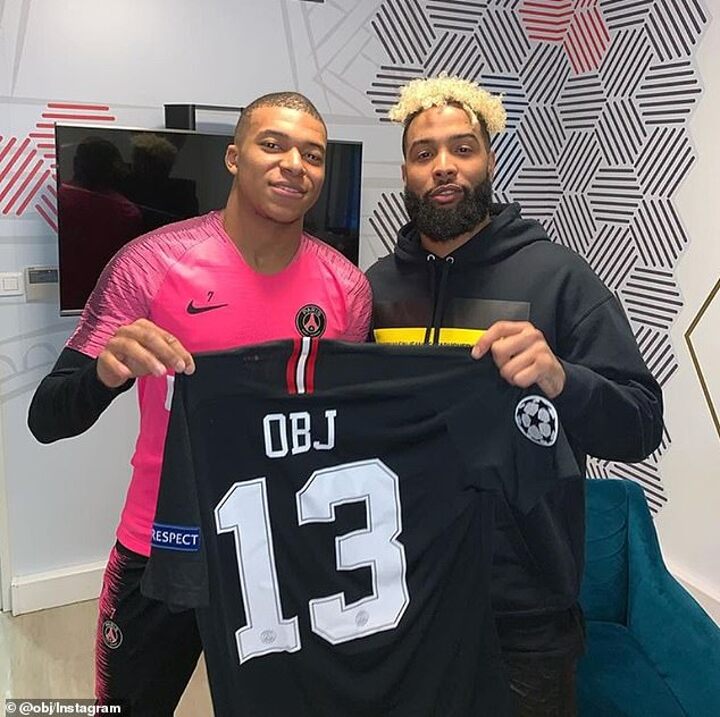 Kylian Mbappe presents NFL star Odell Beckham Jnr with a PSG shirt