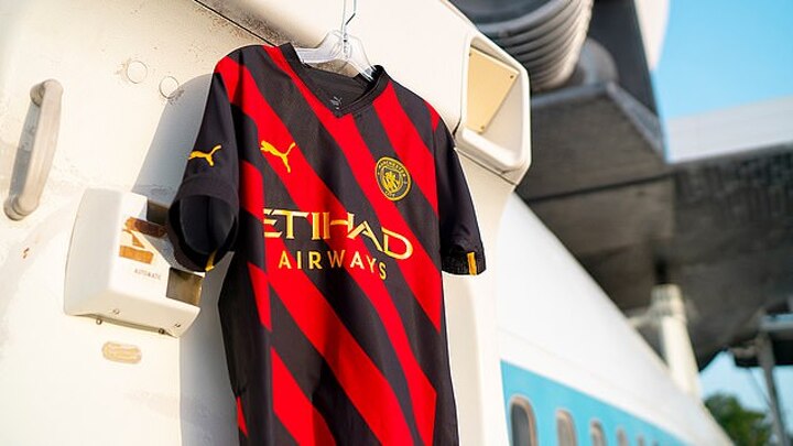 Man city red and black shirt shop