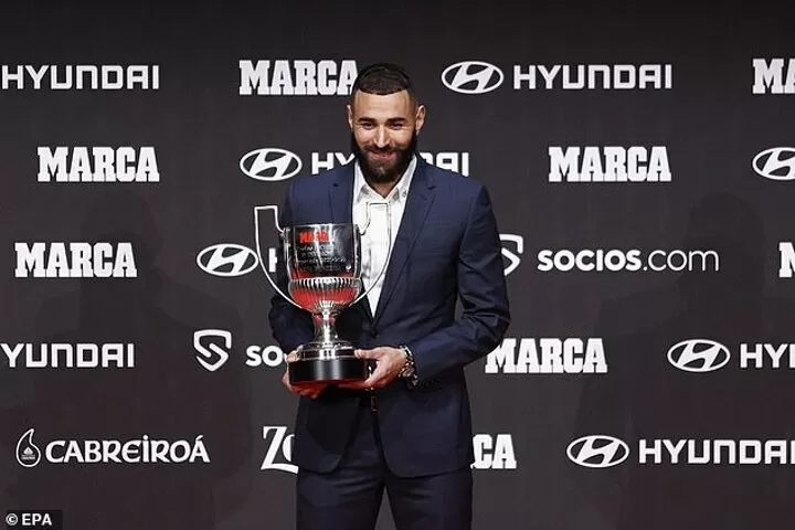 Benzema insists he wants MORE goals as he picks up three awards