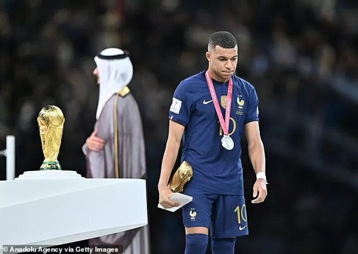 Dejected French players take off their World Cup runners-up medals