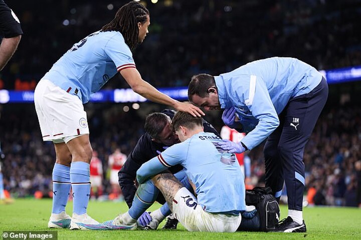 Pep Guardiola confirms John Stones faces a MONTH on the sidelines due ...
