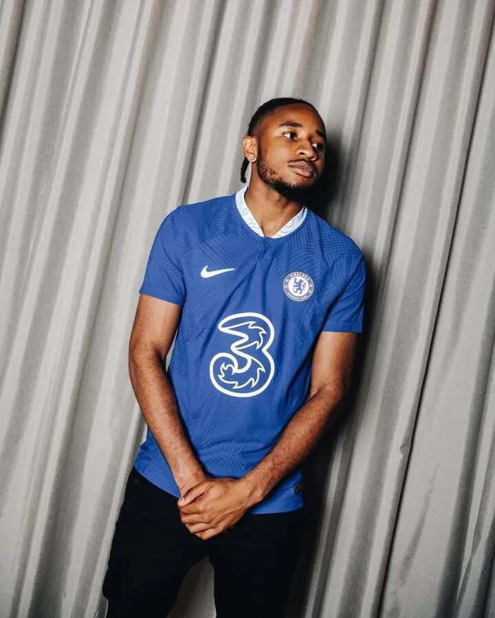 Nkunku pictured in a Chelsea kit for the first time after his 53m