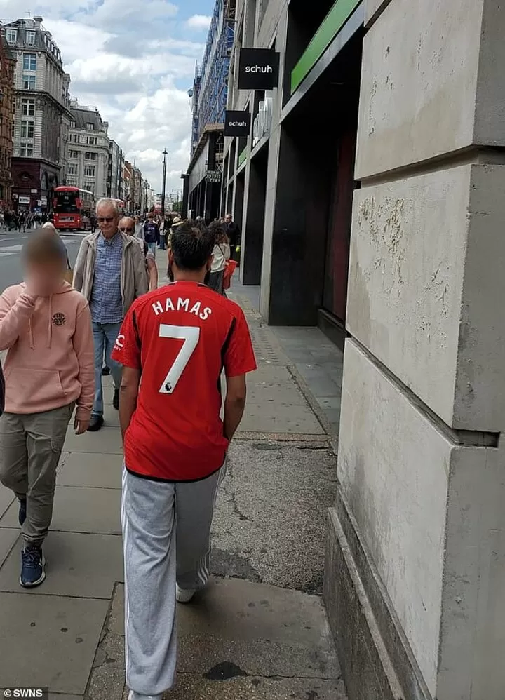 Fan in Manchester United top with Hamas printed parades through London All Football