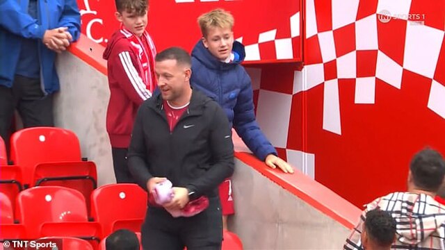 Shocking moment shameless Liverpool fan snatches Alexander Isak's shirt from a child at Anfield
