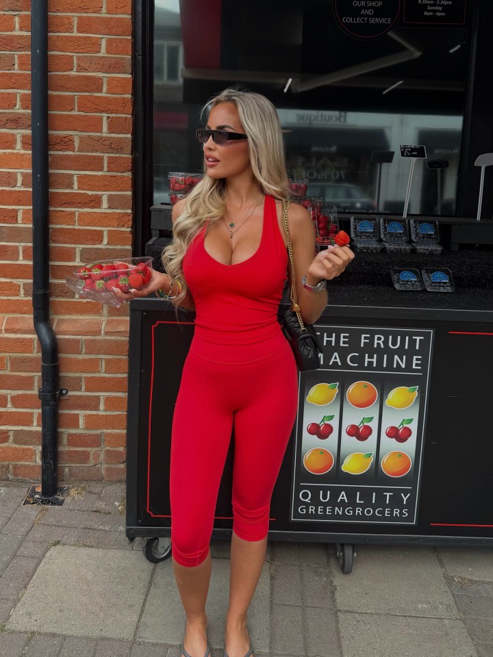 Palmer's girlfriend stuns in all-red outfit outside fruit shop