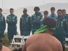 Brazilian players struggle to hold laughter during indigenous welcome ceremony in Australia