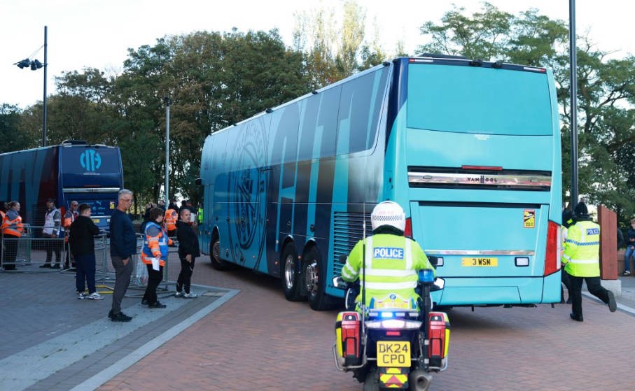 Goal: Manchester City's bus enters Anfield through back entrance to avoid Liverpool fans, decoy bus deployed